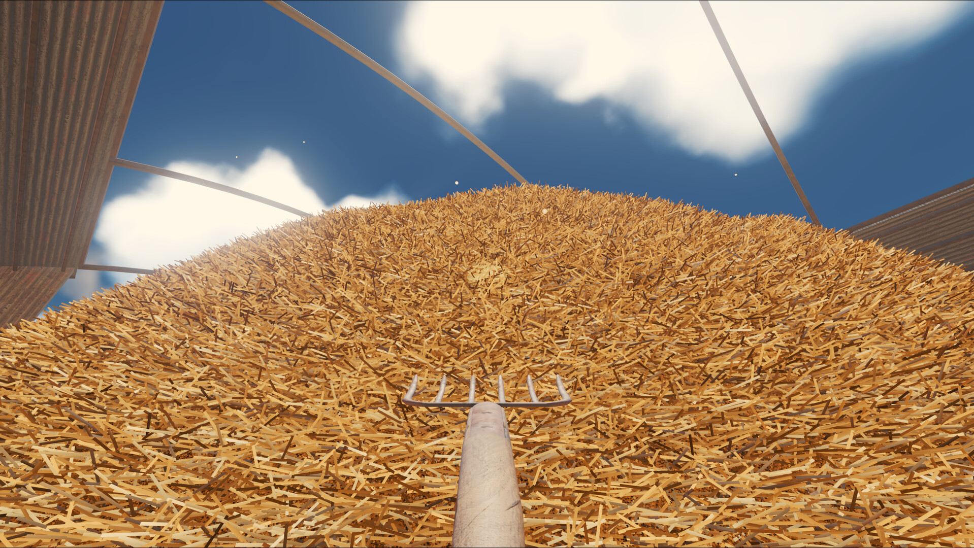 First-person view in Find The Needle: a pitchfork is buried in a mound of golden hay straw under a deep blue sky with white clouds, framed by the wooden walls and roof beams of the yard.